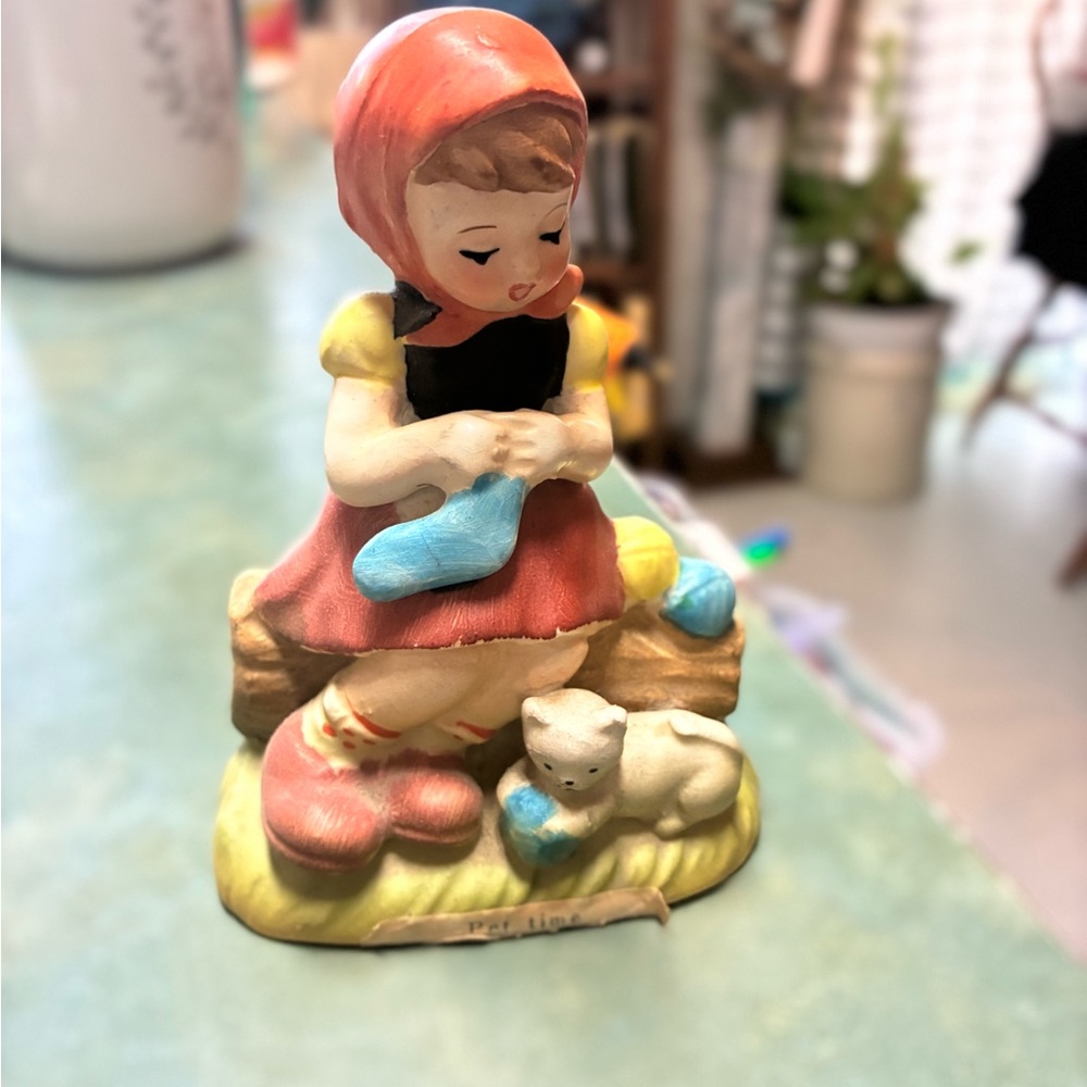 Vintage Figurine with Girl and cat Title “Pet Time “